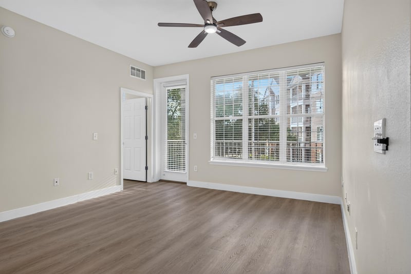Living room window view with wood-look flooring at 11251 Campfield Dr unit 1202, Jacksonville, FL 32256