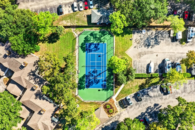 Aerial view of tennis courts and parking area in Jacksonville, FL