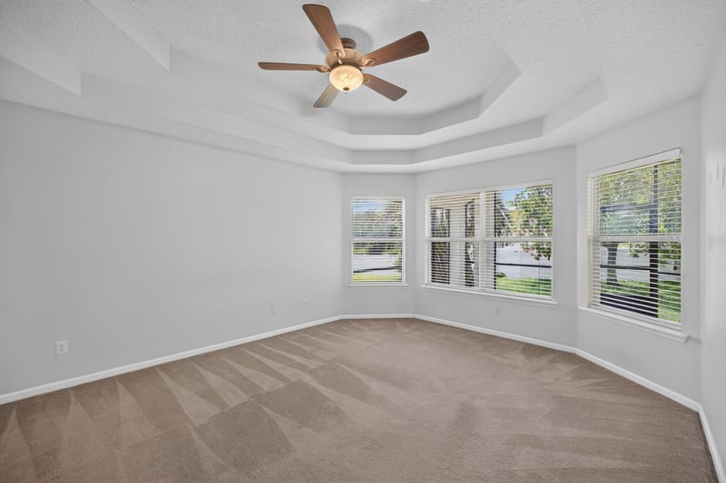 Dining nook with bay window and tray ceiling at 2480 Ridge Will Dr, Jacksonville, FL 32246
