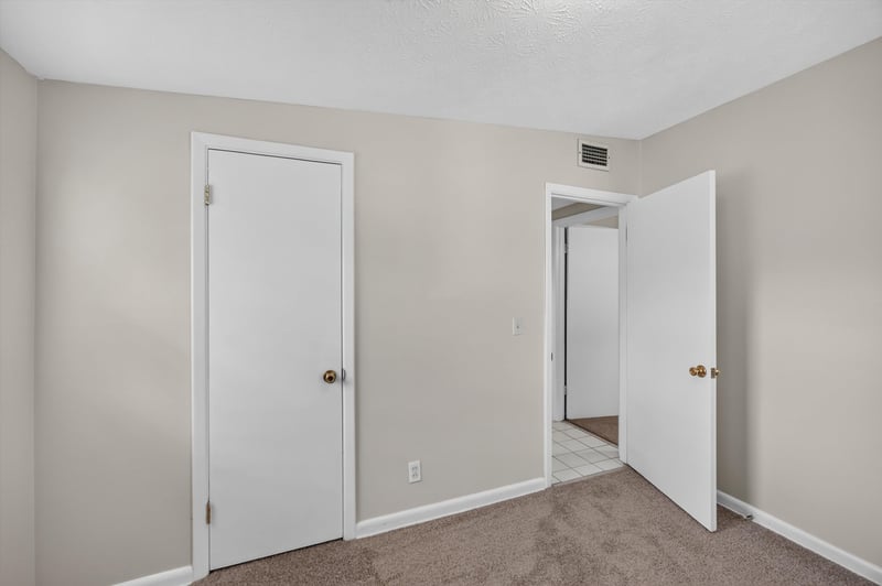 Hallway with doors to bedrooms at 87 Saratoga Cir S, Atlantic Beach, FL