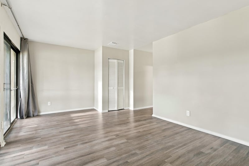 Empty bedroom with wood-look flooring at 7703 Las Palmas Way