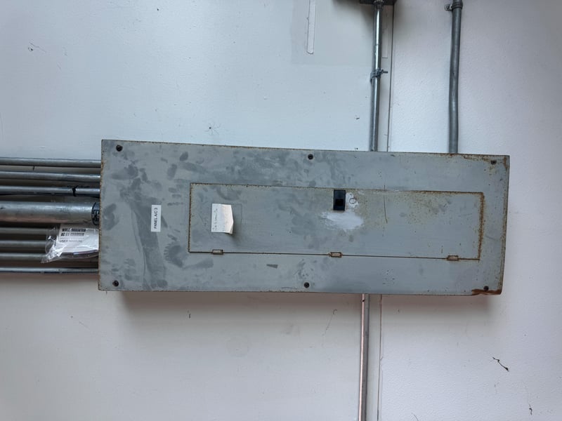 Electrical panel with multiple conduit runs at 11700 New Kings Rd, Jacksonville, FL 32219