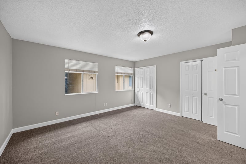 Bedroom closet doors and window at 1800 Park Ave apt 358, Orange Park, FL