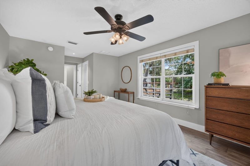 Bedroom with dresser and window at 1161 Whispering Pines Rd, Jacksonville, FL 32259