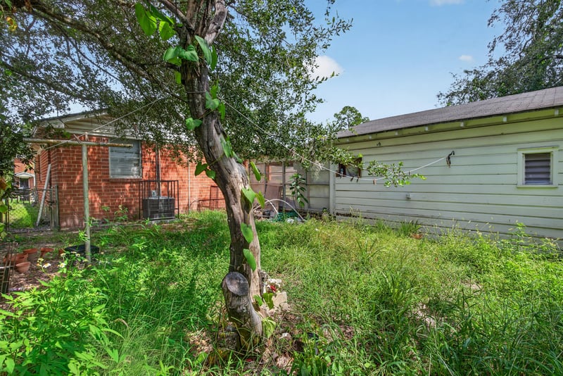 Backyard view with shed and AC unit at 450 E 46th St, Jacksonville, FL 32208