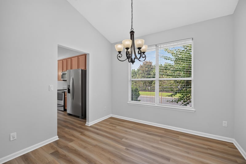 Dining nook with chandelier and window at 3101 E Banister Rd, St. Augustine, FL 32092