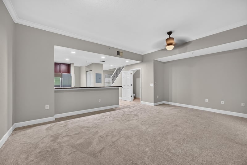 Open living and dining area adjoining kitchen at 9745 Touchton Rd, Jacksonville, FL 32246