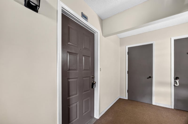 Entry hallway with closet doors at 3801 Crown Point Rd unit 2061, Jacksonville, FL 32257
