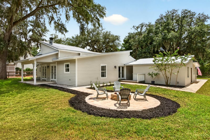 Rear exterior with patio seating area at 1161 Whispering Pines Rd, Jacksonville, FL 32259