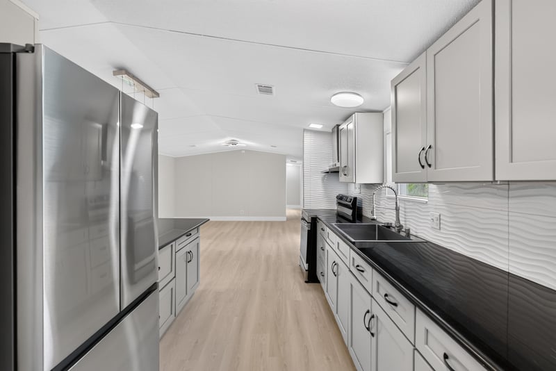 Kitchen with stainless refrigerator at 4565 Appleton Ave, Jacksonville, FL