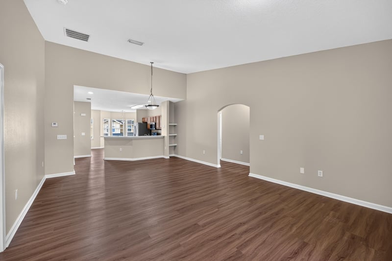 Living area with arched built-in shelving at 3750 Silver Bluff Blvd, Orange Park, FL