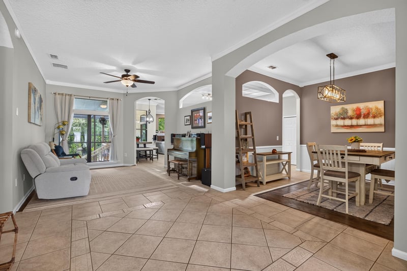 Entry foyer with tile floor opening to living areas at 2125 Blue Heron Cove Dr, Orange Park, FL 32003