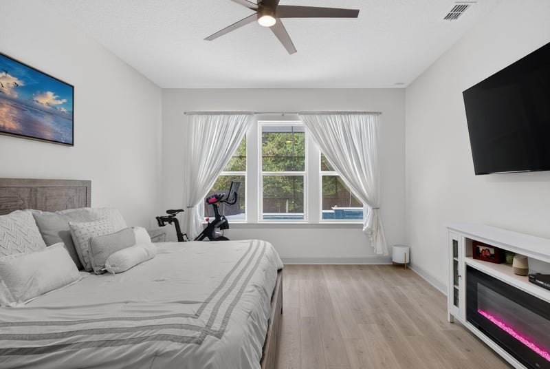 Bedroom with desk area and wood flooring at 785 Back Creek Dr, St. Augustine, FL 32092