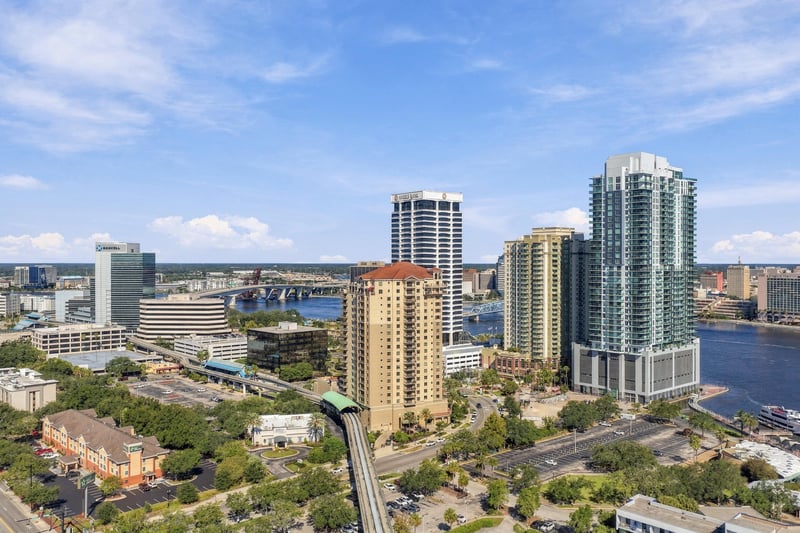 Day aerial of the St. Johns River and towers in Jacksonville, FL