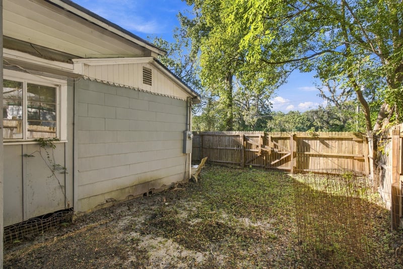 Side exterior of a white addition to the house at 1807 Idlewild Ave, Green Cove Springs, FL