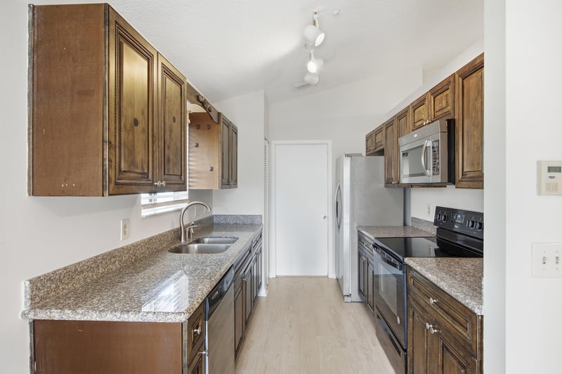 Kitchen sink and cabinet view at 678 5th Ave N, Jacksonville Beach, FL 32250