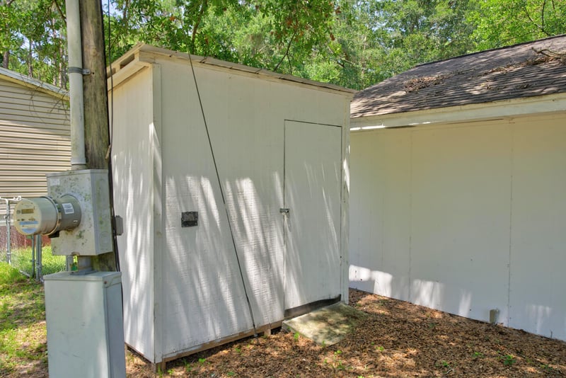 Side of white shed with electrical meter at 2549 Snapdragon Ave, Middleburg, FL 32068