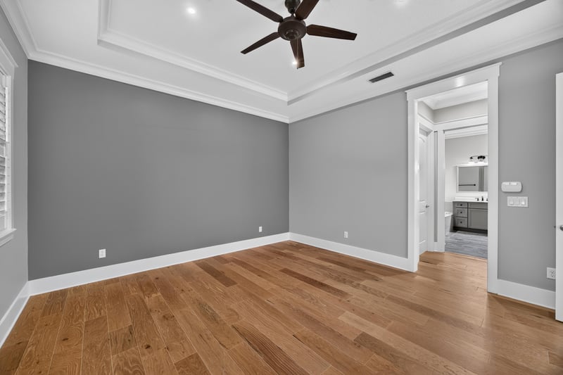 Empty room with ceiling fan and wood floor at 186 Freshwater Dr