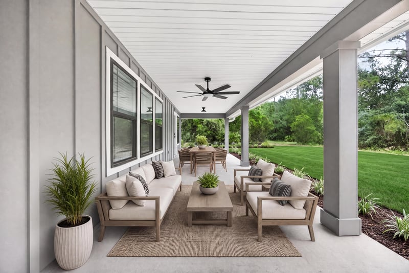 Covered back porch with seating area at 4800 Acacia St, Middleburg, FL 32068