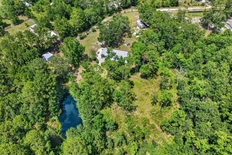 Aerial view of pond and surrounding land in Middleburg, FL