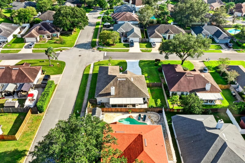 Aerial view of the street and neighboring rooftops at 12825 Kelsey Island Dr, Jacksonville, FL 32224