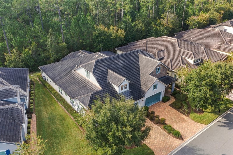 Aerial view of roofline with solar panels, photographed by Megapixeler on Lucena Ln, Jacksonville, FL