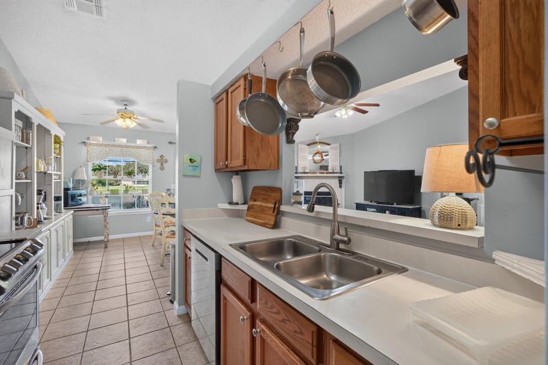 Kitchen sink and tile countertop at 4556 Shaky Leaf Ln N, Jacksonville, FL 32224