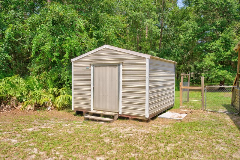 Storage shed in the yard at 2549 Snapdragon Ave, Middleburg, FL 32068