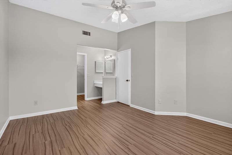 Bedroom with ceiling fan at 8010 International Village Dr, Jacksonville, FL 32277