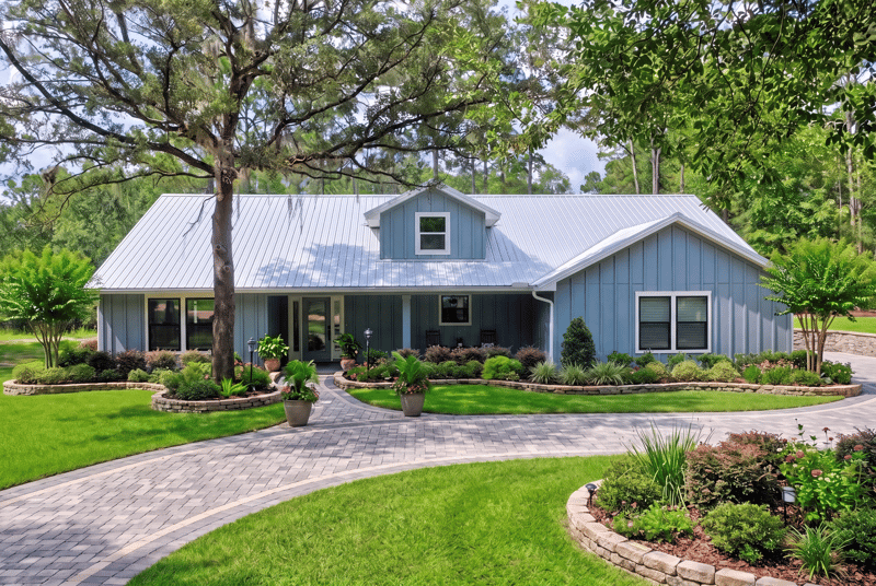 Front exterior close view with covered porch and landscaping at 4800 Acacia St, Middleburg, FL 32068