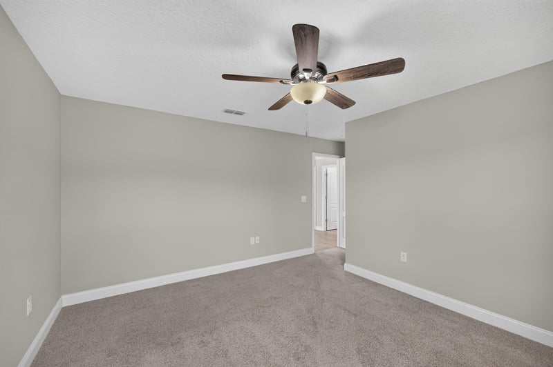 Bedroom with ceiling fan and carpet at 331 Millerstone Dr, St. Augustine, FL 32092