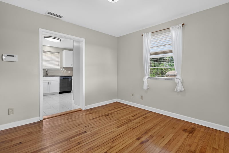 Kitchen entry with wood floors and window at 217 Baisden Rd, Jacksonville, FL 32218