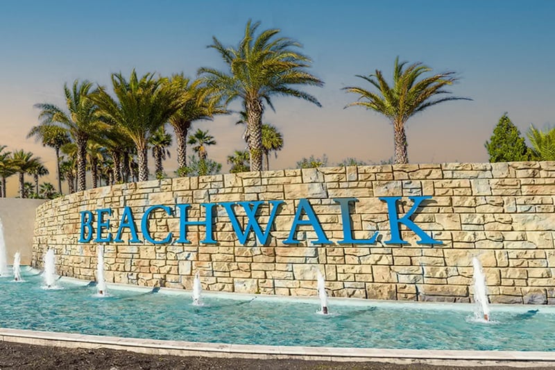 Beachwalk entrance sign with fountains and palm trees, St. Johns, FL