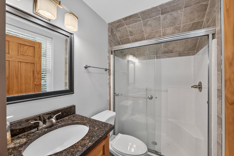 Bathroom with glass shower and vanity at 1735 Hagans Ridge Ct