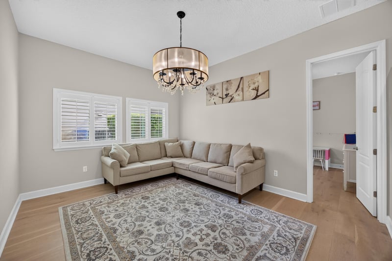 Sitting room with sectional sofa at 276 Cross Ridge Dr, Ponte Vedra Beach, FL 32081