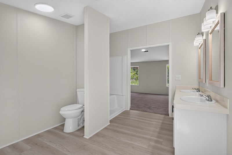 Bathroom toilet and hallway view at 7603 Coach Park Dr, Jacksonville, FL 32244