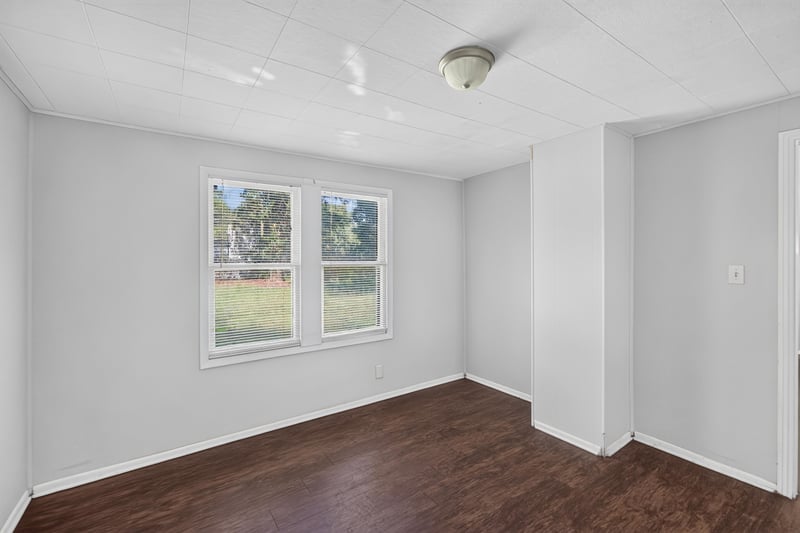 Room with windows and wood floors at 2372 2nd Ave, Jacksonville, FL 32208