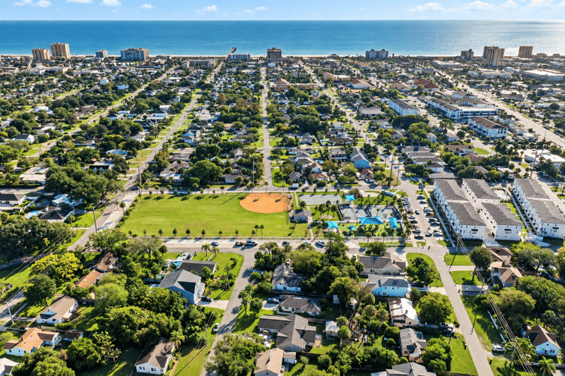 Aerial panoramic view of the neighborhood and a nearby park in Jacksonville Beach, FL