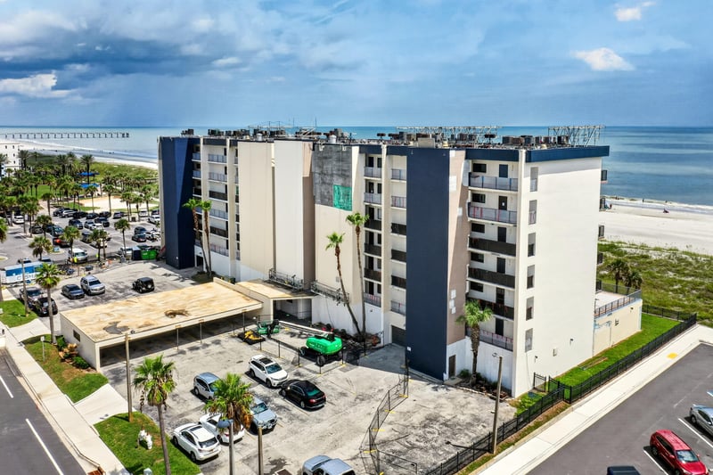 Aerial view of the building with ocean in background at 601 1st St S, Jacksonville Beach