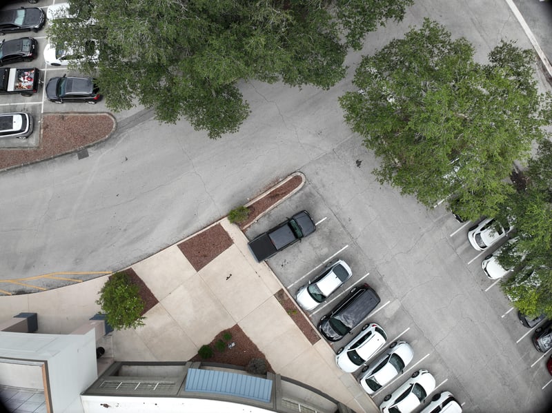 Aerial view of parking lot and tree canopy at 9406 Atlantic Blvd, Jacksonville, FL 32225