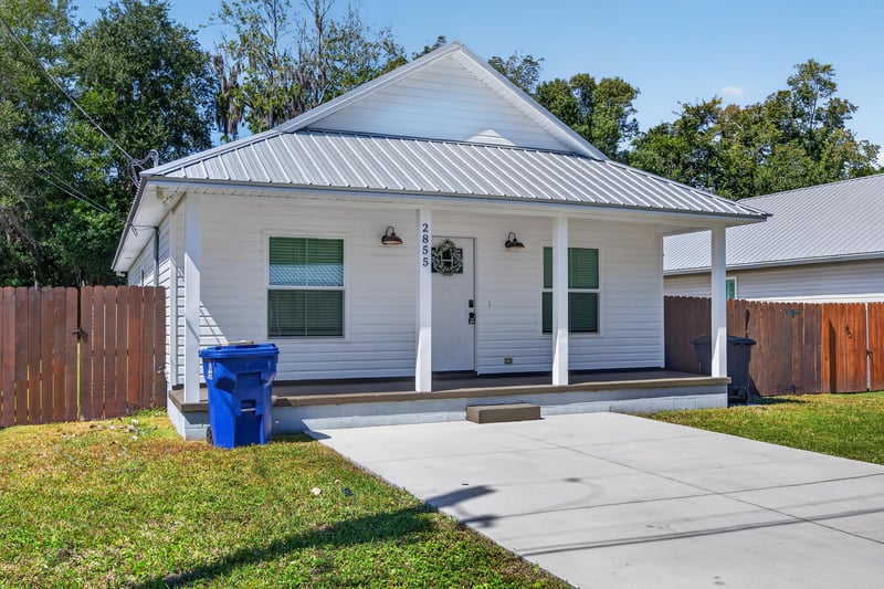 Front entry with porch columns and door at 2855 N 8th St, St. Augustine, FL 32084