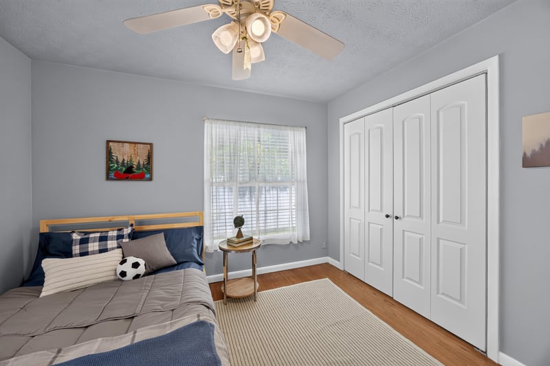 Bedroom with soccer-themed bedding at 5843 Ovella Rd, Jacksonville, FL 32244
