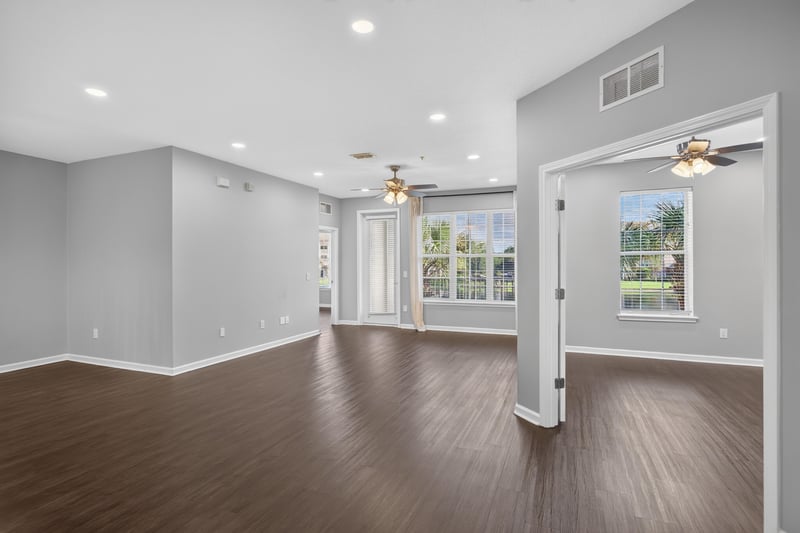 Living and dining area with windows at 11251 Campfield Dr unit 4209, Jacksonville, FL 32256
