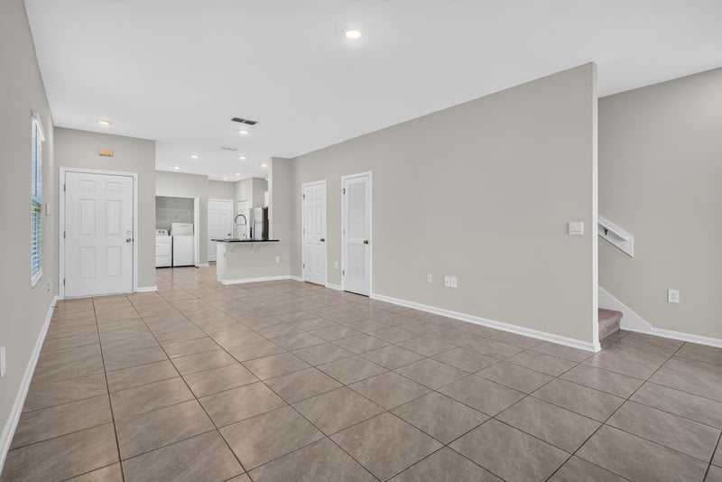 Living area with tile flooring and recessed lighting at 4024 Bay Hawk Ct, Jacksonville, FL
