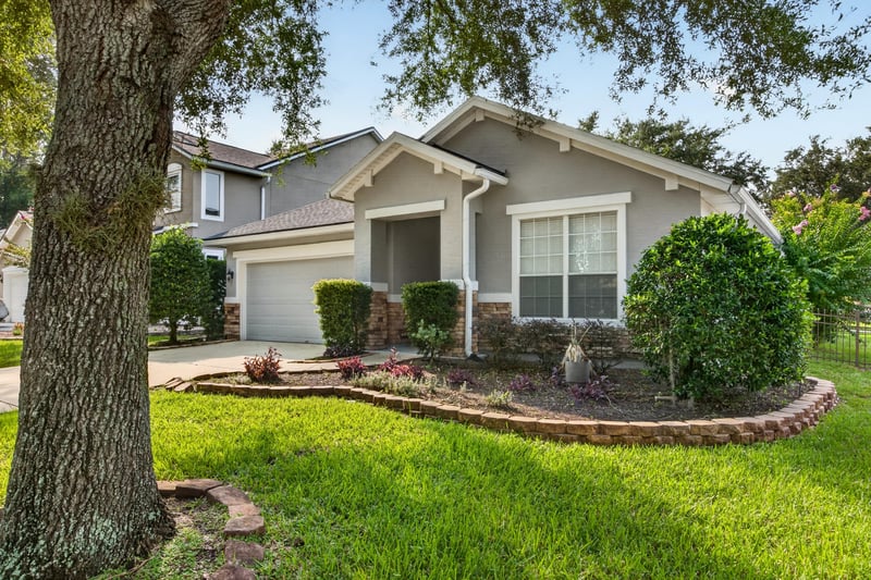 Front yard landscaping and oak tree at 3101 E Banister Rd, St. Augustine, FL 32092