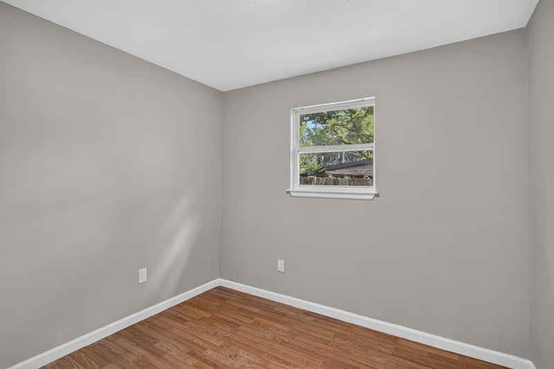 Empty room with window at 7015 Miss Muffet Ln N, Jacksonville, FL 32210