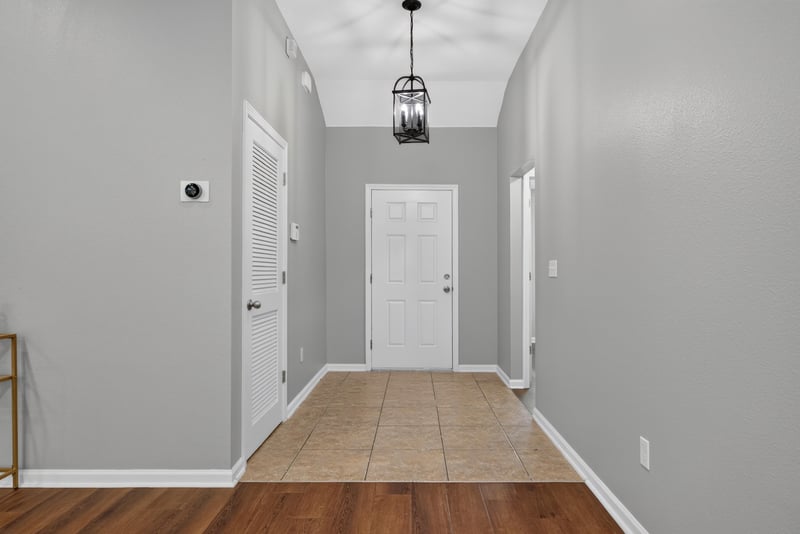 Hallway with closet door at 706 Grampian Highlands Dr, St. Johns, FL 32259