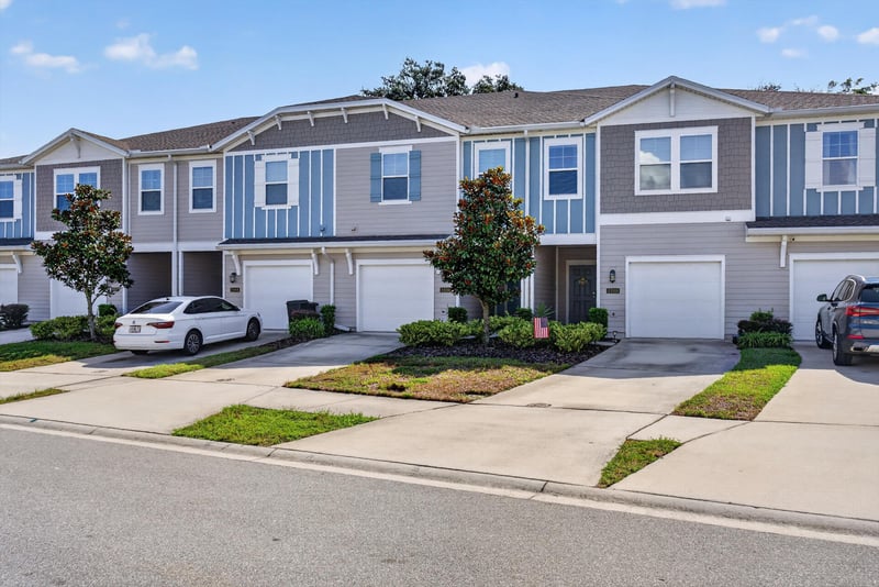 Street view of the townhome row at 1186 Beach Dune Dr, Jacksonville, FL 32233