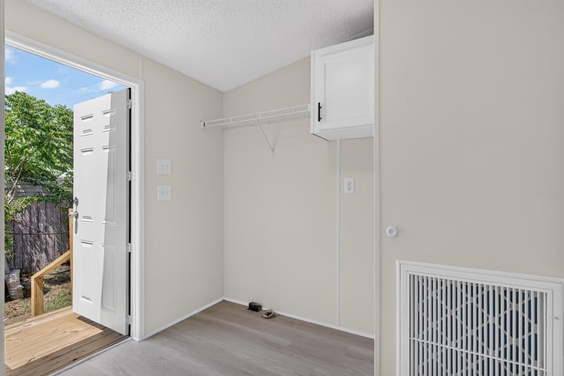 Closet with door open to deck at 7603 Coach Park Dr, Jacksonville, FL 32244