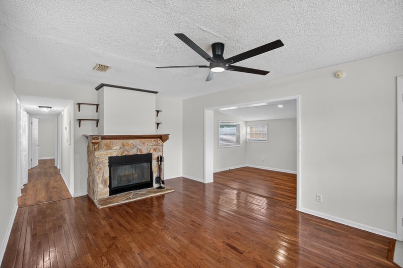 Living room, fireplace and ceiling fan at 4039 Habana Ave, Jacksonville, FL